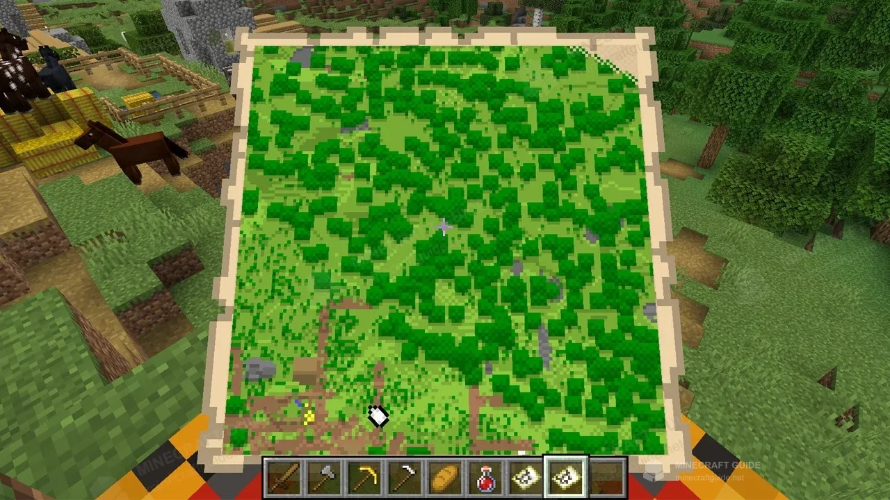 First-person view of an open map showing forest and water